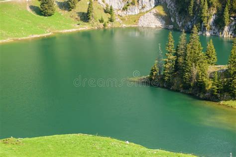 Beautiful Swiss Alpine Landscape With A Mountain Lake Stock Image