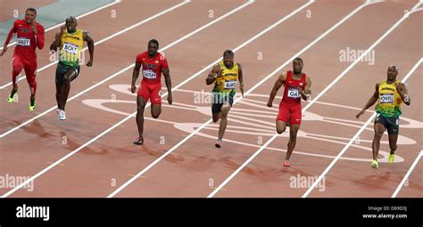 Asafa Powell Of Jamaica R L Tyson Gay Of The United States Yohan Blake Of Jamaica Justin