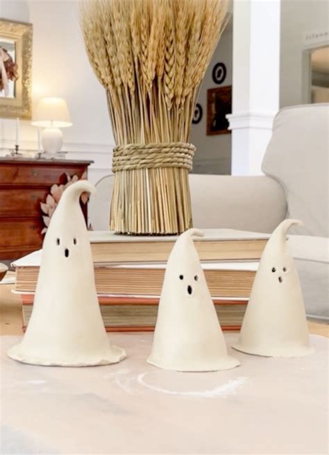 Glowing DIY Air Dry Clay Ghosts For Halloween