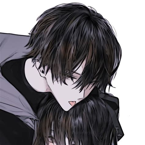 Two People With Black Hair Hugging Each Other