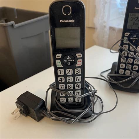 Panasonic Four Handset Cordless Telephone Set with Bluetooth (FR-MK) | EstateSales.org