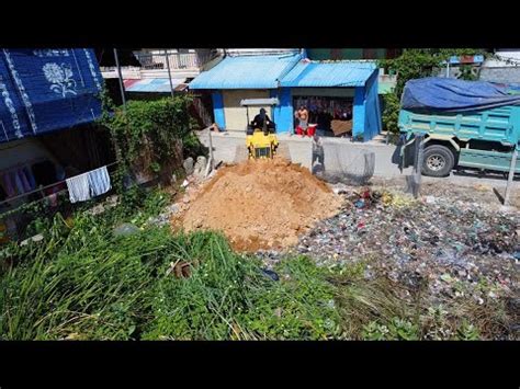 Dozer Starting Up New Project Pushing Soil To Delete Dirt Thrush Water