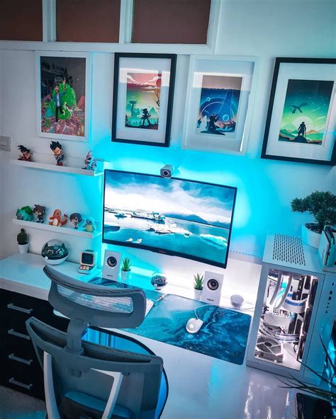 All White Battlestation With Blue Led Lights And Minimal Wall Art For