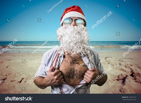 Funny Santa Claus Super Hero Beach Stock Photo (Edit Now) 162575312