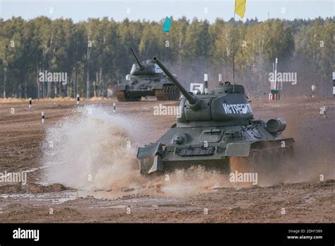 T 34 Tanks Race Across The High Speed Section Past The Stands With