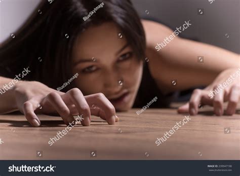 Brunette Girl Crawling On Floor Looking Stock Photo Edit Now 239947198 Shutterstock