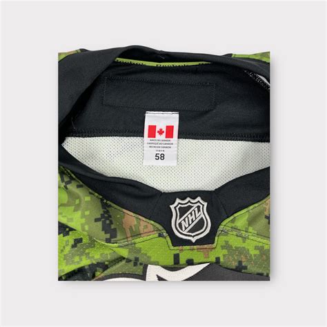 Pro Stock Calgary Flames Reebok Size 58 Camo Hockey Jersey | SidelineSwap
