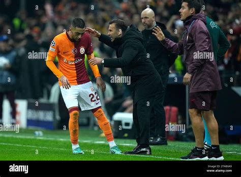 Galatasaray S Head Coach Okan Buruk Talks To Hakim Ziyech During The