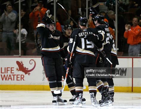 Chris Pronger of the Anaheim Ducks celebrates with teammates Corey ...