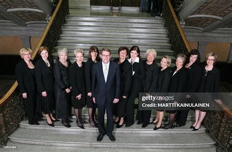 Finnish Prime Minister Matti Vanhanen poses with the female ministers ...