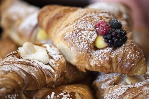 Freshly Baked Croissants On A Plate With Different Fillings Stock Photo