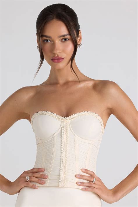 Melvina Ruched Lace Up Strapless Corset Top In Ivory Oh Polly