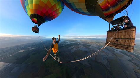 Watch Rafael Bridi Slackline Between Two Hot Air Balloons At