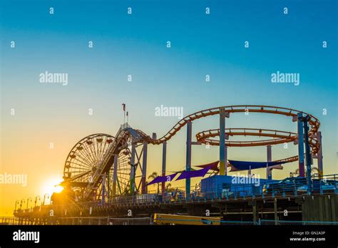 Santa Monica Pier at sunset Stock Photo - Alamy