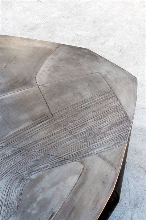 A Close Up View Of A Table Made Out Of Wood And Metal With An