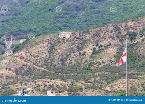 Georgian Flag on a Background of Caucasus Mountains Stock Photo - Image ...