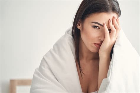 Premium Photo Close Up Portrait Of Woman Wrapped In A Duvet Touching