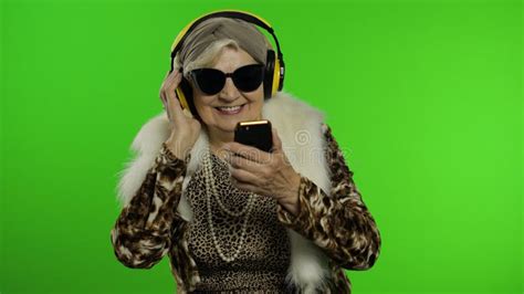 Elderly Caucasian Grandmother Woman Dance Celebrate Listen Music