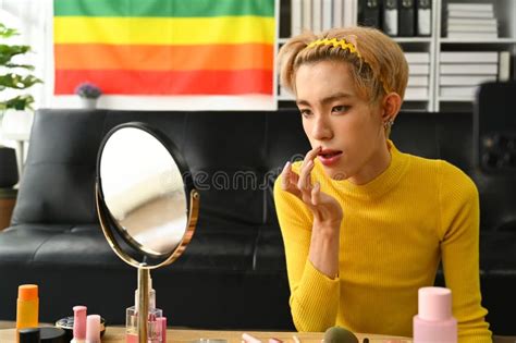 Smiling Asian Gay Man Blogger Filming Daily Makeup Routine Tutorial On Smartphone Lgbtq