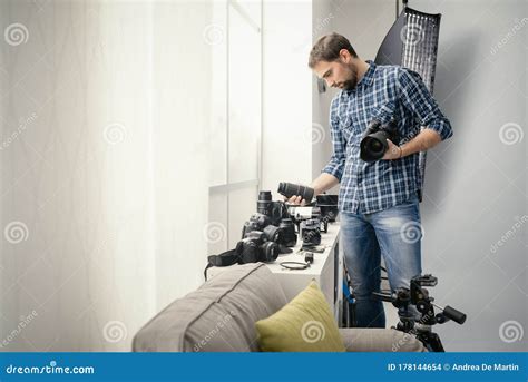 Photographer Choosing Lens Stock Photo Image Of Professional