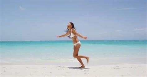 Happy Bikini Woman Jumping Of Joy And Su Stock Video Pond