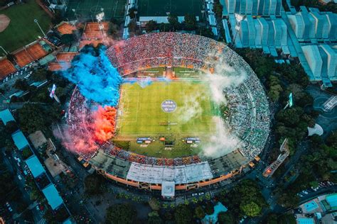 Aerial View of Stadium with Blue and Red Smoke · Free Stock Photo