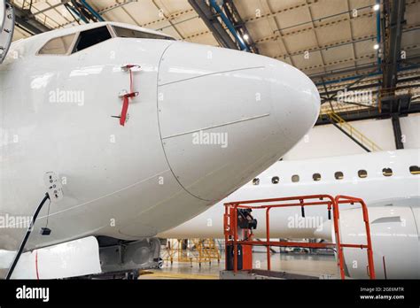 Close Up Shot Of Fuselage Of Modern Passenger Airplane On Maintenance