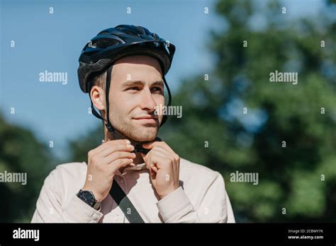 Preparation For Ride To Bicycle In City Handsome Young Man In Shirt