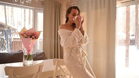 Beautiful Slim Naked Woman Long Hair Goes To Panoramic Windows Slowly Taking Off The White