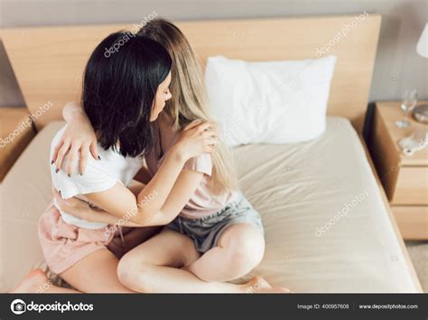 Lesbian Couple Hugging On Bed In Bedroom Love Feeling Concepts Stock Photo Ufabizphoto