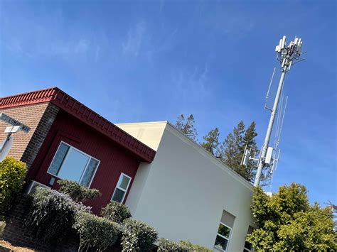 Cell tower expanded above city hall - by Laura Hagar Rush