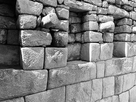 Inca stone walls at Machu Picchu, Peru. - Ryder Walker