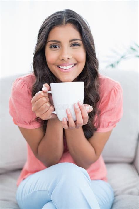 Cheerful Cute Brunette Sitting On Couch Holding Mug Stock Photo Image Of Indoors Sofa 35014656
