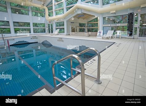 Public indoor wave swimming pool Stock Photo - Alamy