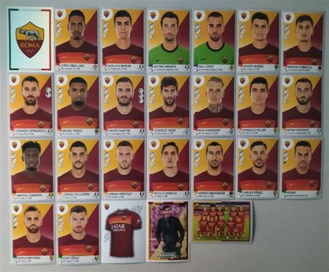 A Bunch Of Soccer Cards That Are On The Wall