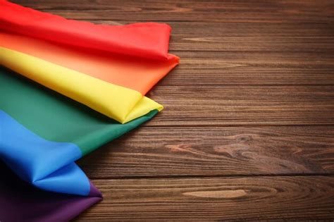 Premium Photo Rainbow Gay Flag On Wooden Background