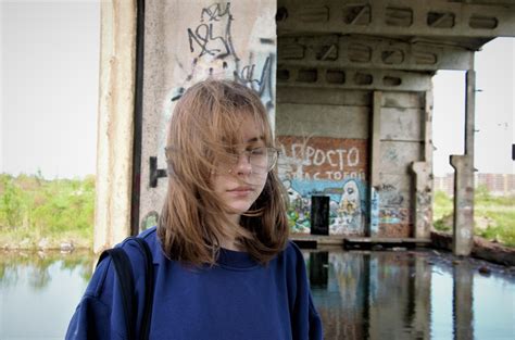 portrait of a girl in an abandoned building. The Brooding Teenager ...