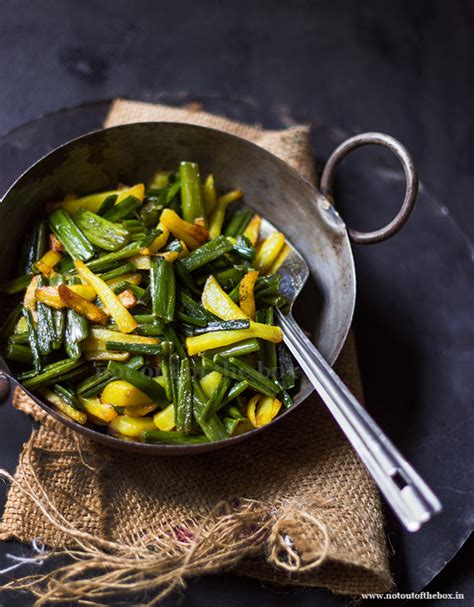 Aloo Peyanjkoli Bhaja Stir Fry Of Potatoes And Onion Flower Stalks