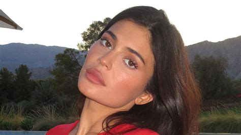 Kylie Jenner Goes Braless And Nearly Spills Out Of Dress As She Barely