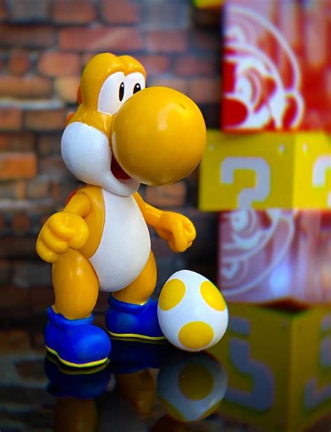 Brinquedo Boneco Action Figure Yoshi Laranja Ovo New Super Mario