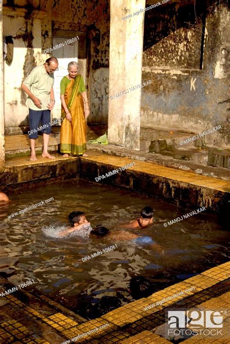 Old Couple Watching Holy Water Of Hot Spring At Ganeshpuri Near Vajreshwari District Thane