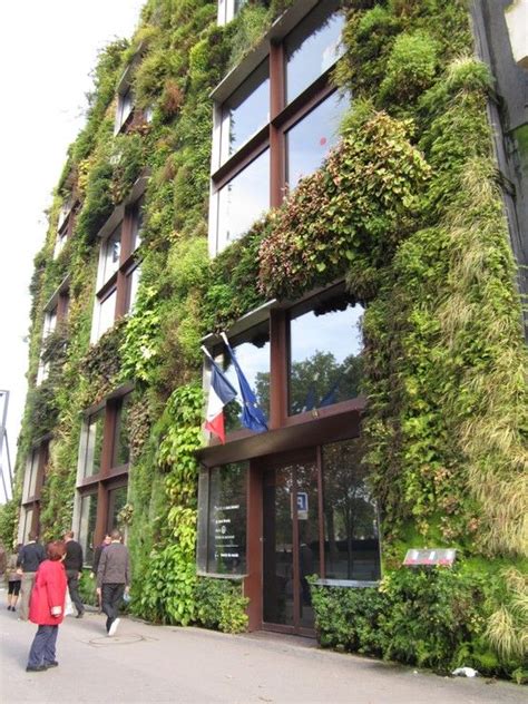 Amazing Building With Plants Growing On It Near Eiffel Tower Paris