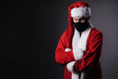 Premium Photo | Santa claus in face mask