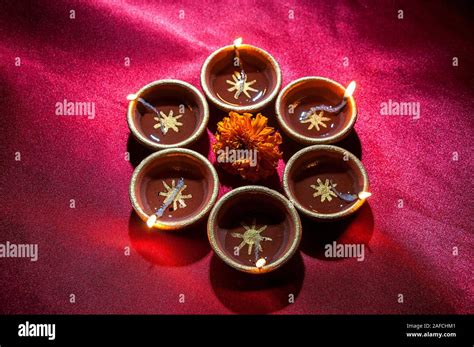 Clay Diya Lamps Lit During Diwali Celebration Greetings Card Design