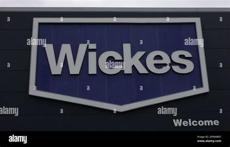 Logo of Wickes seen on the exterior of an outlet in the UK Stock Photo ...