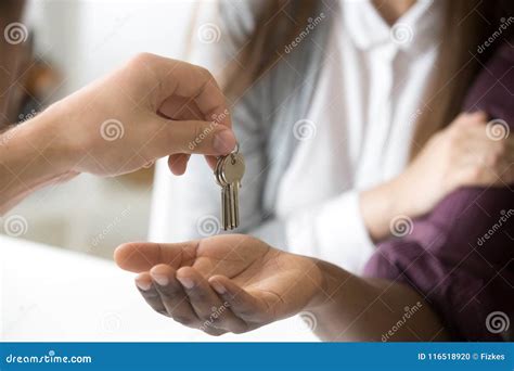 Realtor Giving African Customer Keys Couple Buying New House C Stock