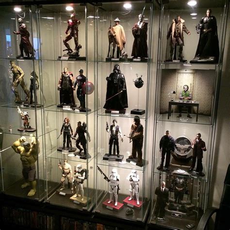 Star Wars Action Figures Displayed In Glass Cases