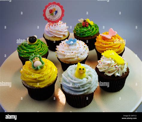 Birthday Cupcakes With Various Decorations Stock Photo - Alamy