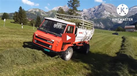 Heuernte In Den Bergen Transporter Metrac Und John Deere Traktor