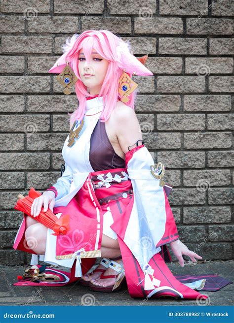 Female Cosplayer in a Pink Anime Costume Wearing Pink Hair Stock Photo - Image of exhilaration ...